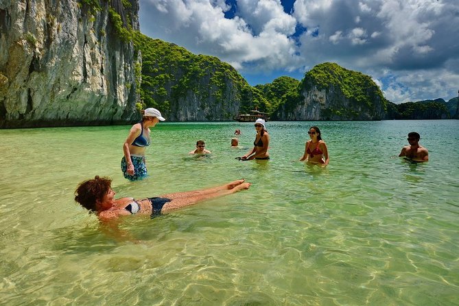 1 Day Boat Tour: HaLong Bay, Lan Ha Bay, Natural Beach and Full Moon Party - How the guide affects the day