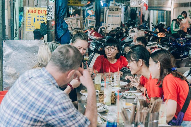 12 Tasting Street Food & Sightseeing By Scooter with Student - Ho Thi Ky Flower Market and Its Snack Stalls