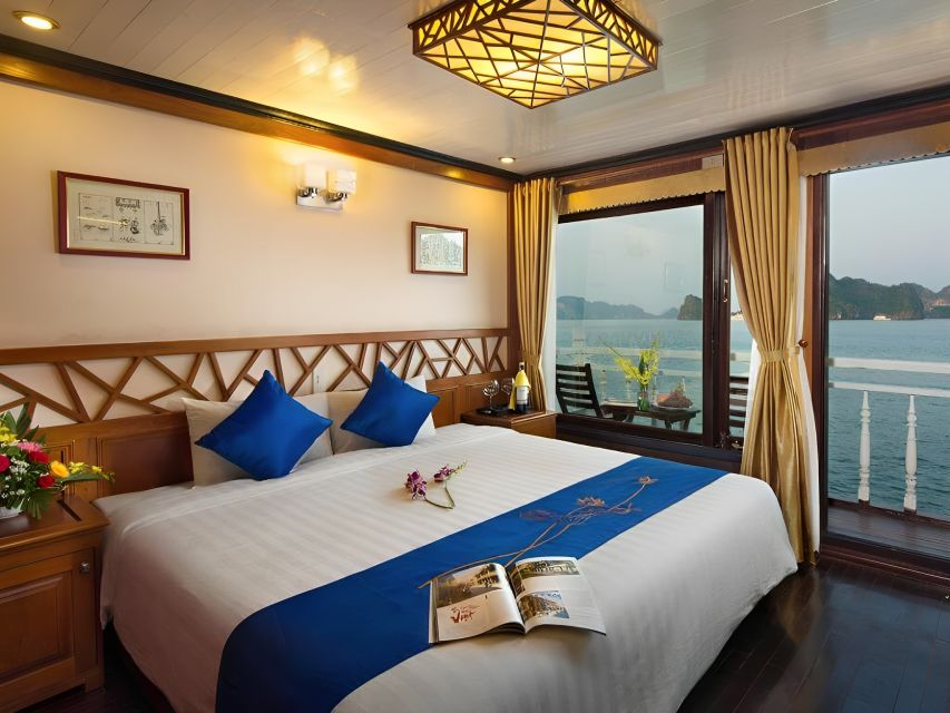 2-Day Royal Palace Ha Long Bay & Ti Top Island Cruise - Kayaking beside the limestone cliffs