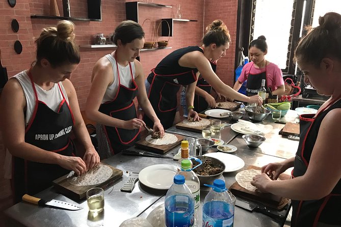 5 Traditional Dishes Hanoi Cooking Class with Market Trip - Sitting down to eat your own work