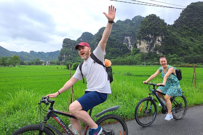 Amazing Ninh Binh Day Tour: Mua Cave - Tam Coc - Hoa Lu - Cycling through rice fields and village life