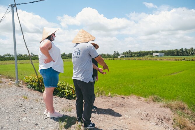 Authentic Mekong Delta Tour With Local Experts - A family homestead with coconut and Mekong whiskey