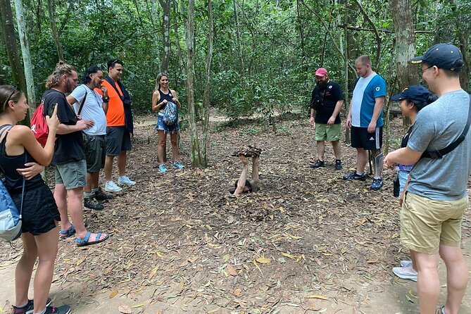 Ben Duoc 'Less-Crowded' Cu Chi Tunnels Half-Day Tour - Crawling into the tiny tunnels