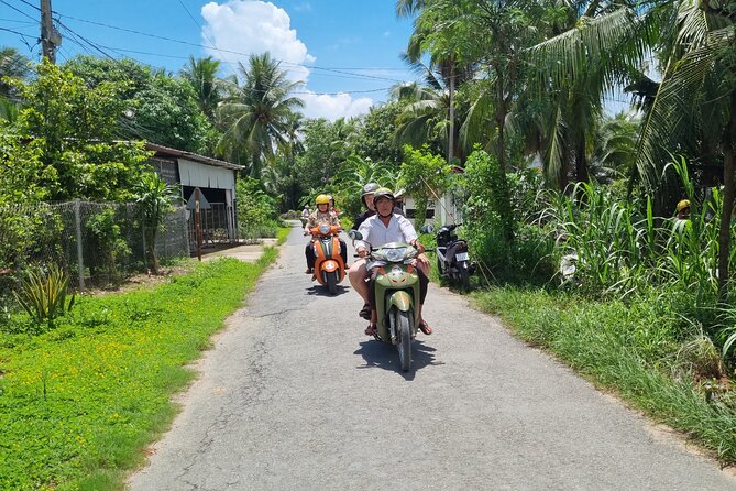 Ben Tre Mekong Zig Zag: Scooter, Sailboat, and Food (Full day) - Ben Tre city, market snacks, and the final ride