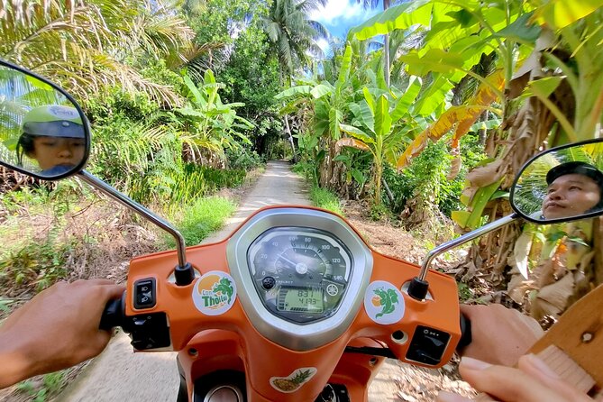 Ben Tre: Scooter, Culture, Sailboat and Mekong Food (Half Day) - Ben Tre market, fruit tasting, and back streets
