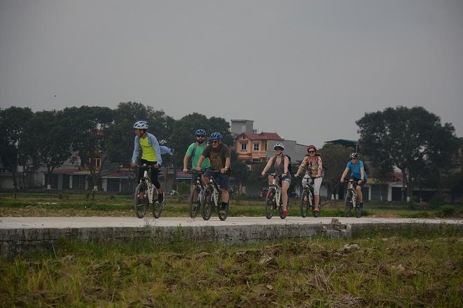 Bicycle Tours Hanoi: Full Day Bicycle Tours City & Countryside - Riding beside the Reunification railway