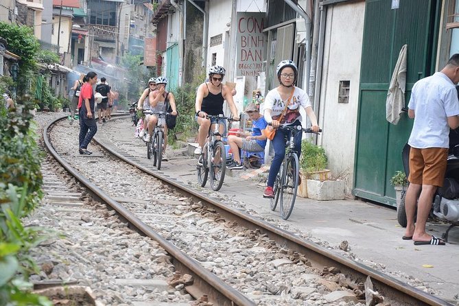 Bicycle Tours Hanoi: Half Day Hanoi City Bicycle Tours - Central Hanoi landmarks between local stops
