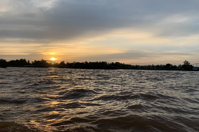 Cai Rang floating market, see sunrise, CaCao orchard, small canal - Sunrise on the Can Tho River