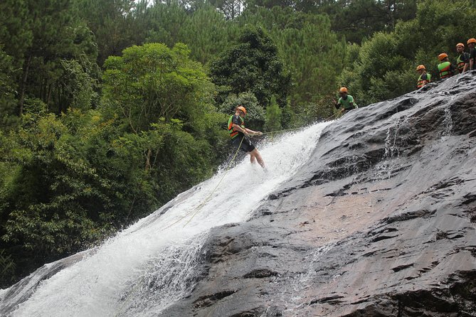 Canyoning Da Lat Vietnam - Water sliding gives the route a playful pause