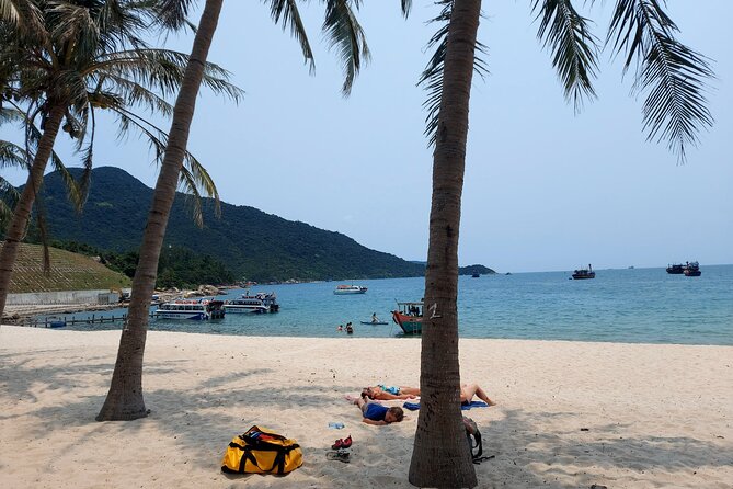 Cham Island Snorkeling Daily Group Tour, Sunbathing, nice beaches - Cham Island’s marine area, old well, and village sights