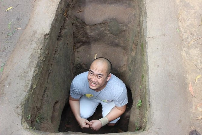 Cu Chi Tunnels and Mekong Delta 1 Day Full Day tour - Entering the Cu Chi Tunnels