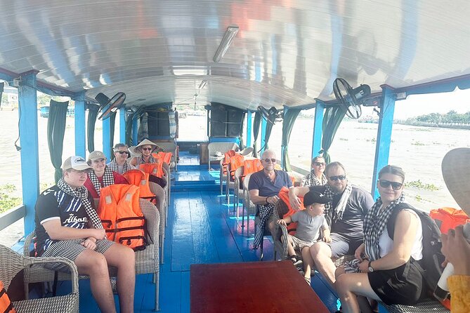 Cu Chi Tunnels and Mekong Delta 1 Day Tour from Ho Chi Minh City - Traps, workshops, and the B52 bomb hole