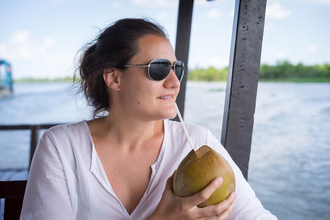 Cu Chi Tunnels and Mekong Delta 1 Day Tour from Ho Chi Minh City - The sampan ride through water coconut canals