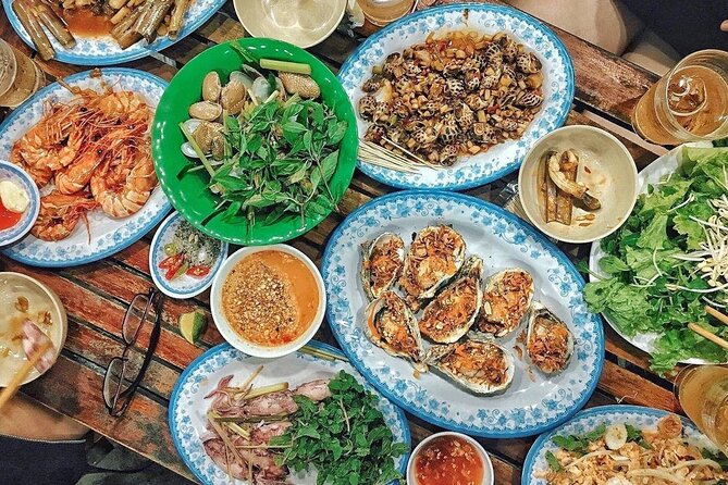 Da Nang By Night: Seafood dinner, night market and cruise trip - Riding past Dragon Bridge, Han Bridge, and Love Bridge