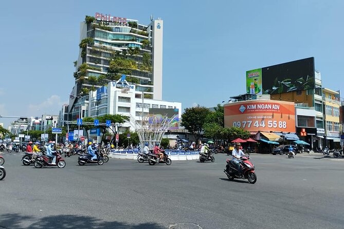 Da Nang Food Tour Motorbike & Sightseeing By Ao Dai Lady Rider - APEC Park for a short riverfront walk