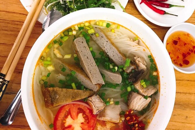 Da Nang Food Tour Motorbike & Sightseeing By Ao Dai Lady Rider - Starting at Love Bridge beside the Han River