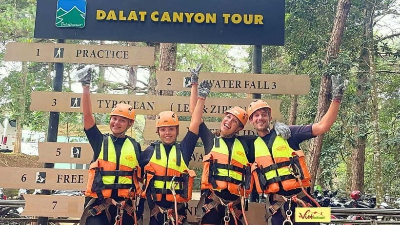 Dalat: Canyoning Extreme Adventure Vietnam - Water sliding on naturally worn rock