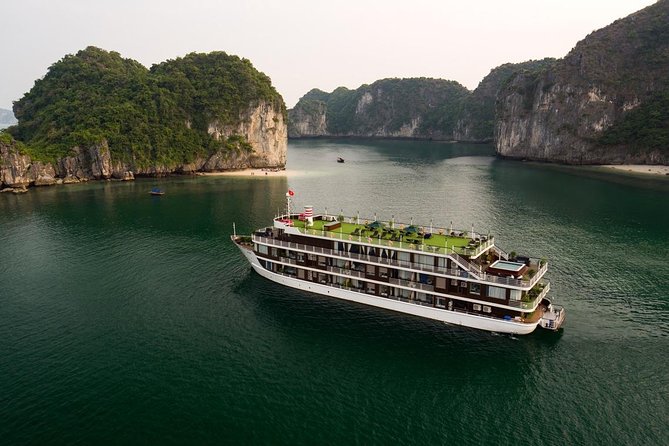 Doris Cruise 5 star cruise 2 days visiting Halong Bay Lan Ha Bay private balcony - Day 2: sunrise tai chi and Dark and Bright Cave