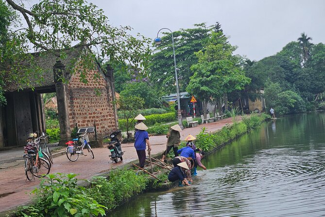 Duong Lam Village & Ba Vi National Park Jeep Tour From Hanoi - Walking through 2,000-year-old Duong Lam