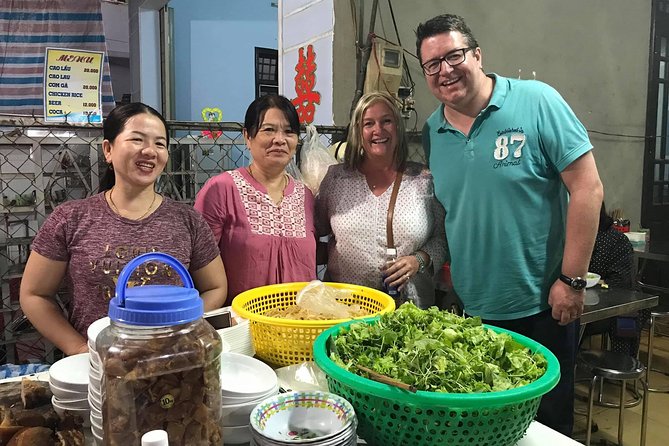 Evening Walking Food Tour, folk game and lantern boat - The first tastings: banh mi and white rose dumplings