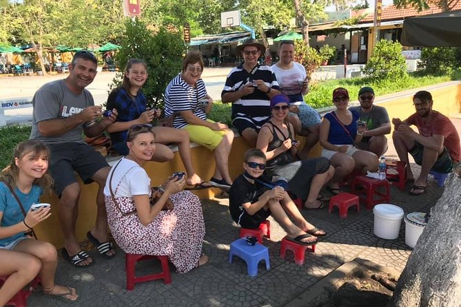 Evening Walking Food Tour, folk game and lantern boat - Dinner at a local house