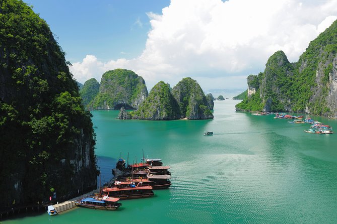 Excursion to Ha Long Bay with Titop Island and kayaking in Luon Cave - Boarding the traditional junk at Tuan Chau