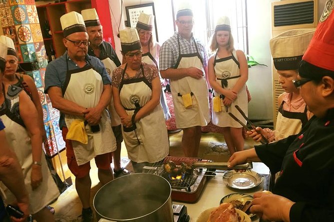 Experience half-day cooking class with market visit - Cooking a regional Vietnamese meal