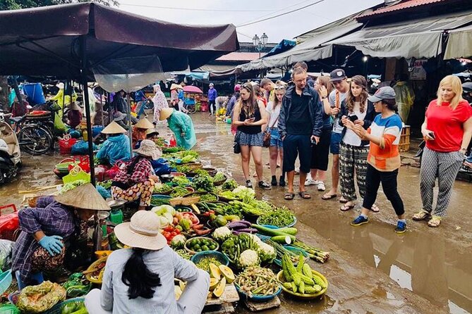 Experience Local Market and Boat Ride with Cooking Class - Riding a bamboo basket boat through the coconut forest