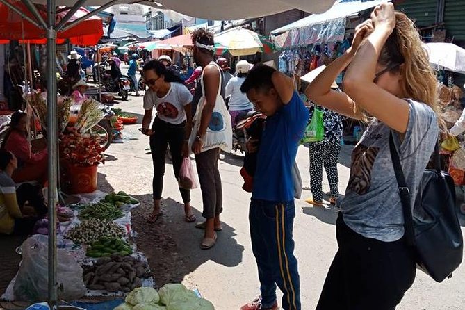 Explore Vietnamese Cuisine: Cooking Class from Ho Chi Minh City - Seeing Vietnamese ingredients at a local wet market