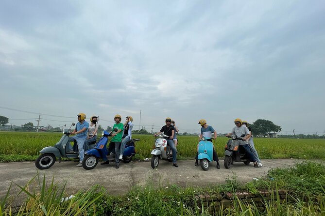 Exploring Vespa Tour Through Little Red River Delta - The Opera House and Hanoi’s grander side