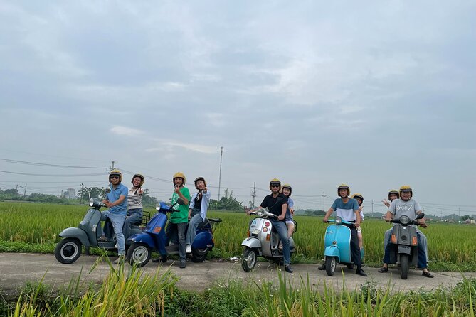 Exploring Vespa Tour Through Little Red River Delta - The ride through rice fields and village roads