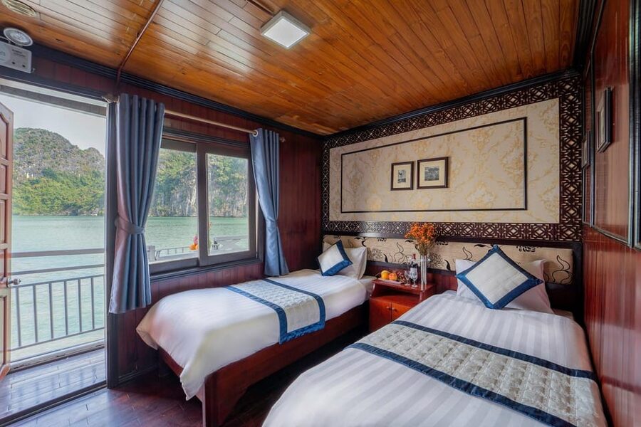 From Hanoi: 2-Day Ha Long Bay Boat Tour - Boarding the boat and settling into the cabin