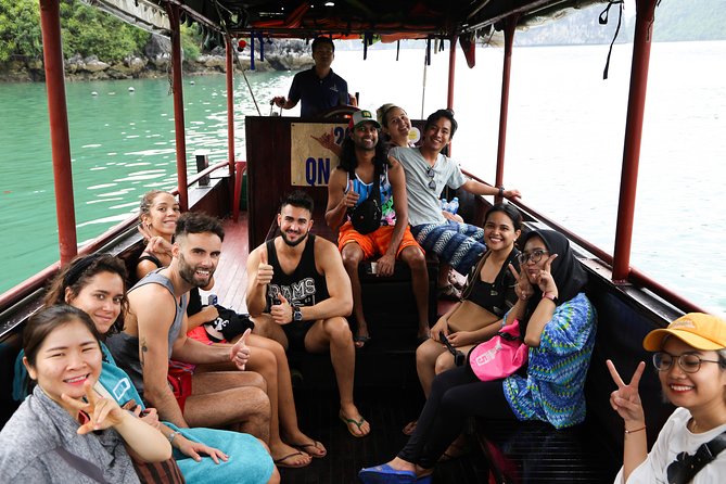 From Hanoi: 2D1N Ha Long Bay Deluxe Cruise with Bus Limousine - Sunset on the sundeck and an evening afloat