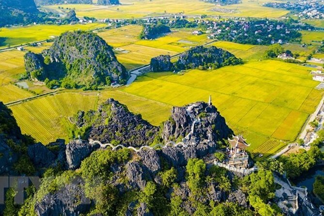 From Hanoi: Hoa Lu, Tam Coc, and Mua Cave Scenic Day Trip - Guide style and the human side of the day
