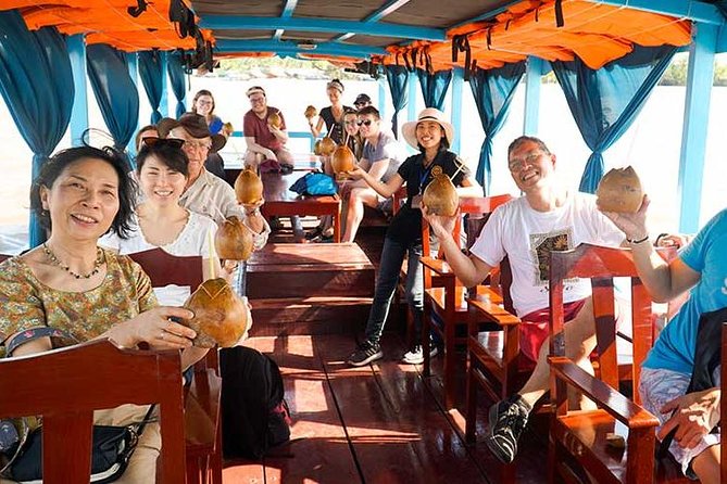 From HCM City: Mekong Delta Tour with Sampan Journey - Unicorn Islet, fruit, honey tea, and folk music