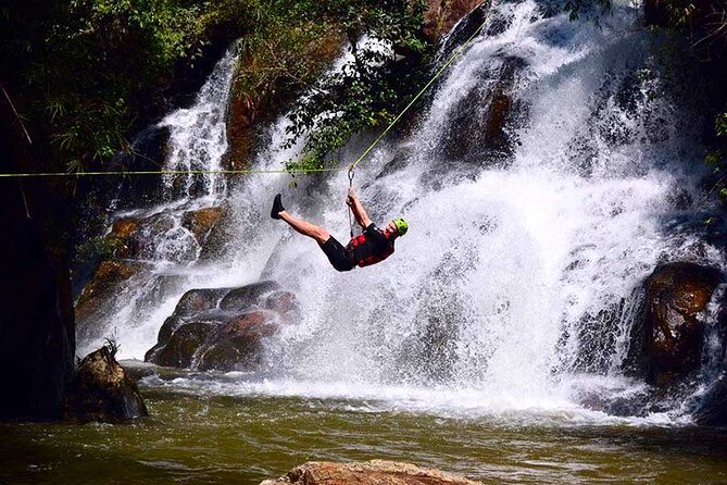 Full Day Canyoning Activity in Da Lat with Lunch - Crossing the Tyrolean Traverse above the waterfall