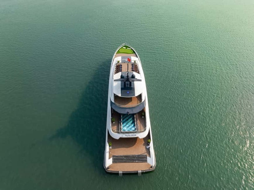 Full Day: Fabulous Halong Bay Tour with Taliya Cruise 5<em> – Key points to know before booking’ /></p>
<ul>
<li><strong>A full day on the bay without an overnight stay:</strong> You get a seven-hour cruise, lunch, activities, afternoon tea, and a return to Hanoi the same evening.</li>
<li><strong>Two different bay areas in one outing:</strong> The route includes classic Halong Bay scenery and the quieter Ao Ech area of Lan Ha Bay.</li>
<li><strong>Dark and Bright Cave is visited by bamboo boat:</strong> A local rower takes you through the cave system toward enclosed lagoons.</li>
<li><strong>Swimming is part of the plan:</strong> You can kayak or swim at Ao Ech, a feature many Halong Bay day cruises skip.</li>
<li><strong>The $57 price covers the main costs:</strong> Transport, cruise, entrance fees, lunch, guide, water, bamboo boat, kayaking, and the cooking class are included if you choose the transfer option.</li>
<li><strong>The schedule depends on nature:</strong> Storms, tides, and operating conditions can change the route, food, or departure plans.</li>
</ul>
<h2 id="what-the-57-halong-bay-day-trip-really-gives-you">What the $57 Halong Bay day trip really gives you</h2>
<p><img width="820" height="614" decoding="async" src=