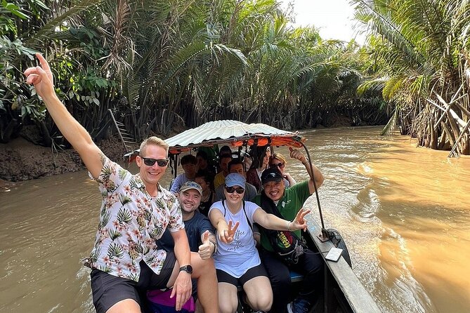 Full-Day Tour in Mekong Delta with Pick Up in Central District 1 - Con Lan: honey tea, fruit, and southern music