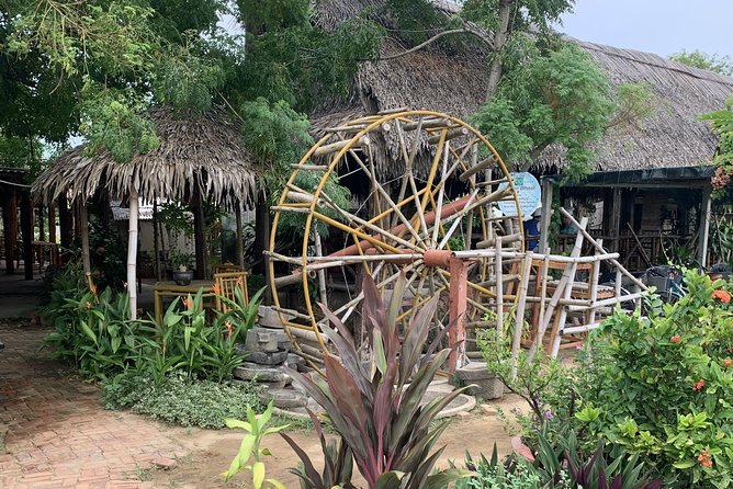 Full Experience Tour: Cooking Class & Basket Boat at Eco-Village - Rowing a round bamboo basket boat
