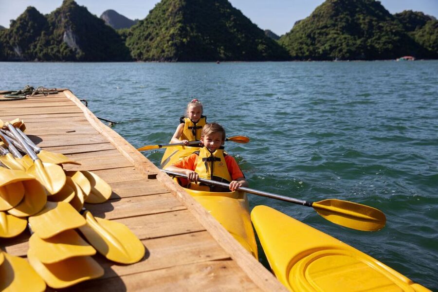 Ha Long & Lan Ha Bays: 2-Day Cruise with Meals & Kayaking - Reaching V’Spirit Cruises at Tuan Chau Harbor