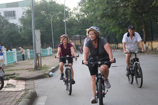 Half-Day Bicycle Tour Combine City & Countryside + Train Street - Reaching Hanoi’s railway corridor