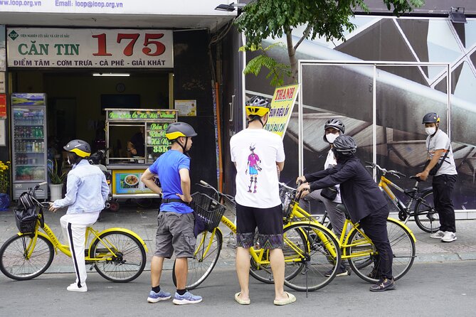 Half Day - Saigon Off-the-Beaten-Path - City Cycling Tour - District 10, the Umbrella Market, and a 1968 apartment complex