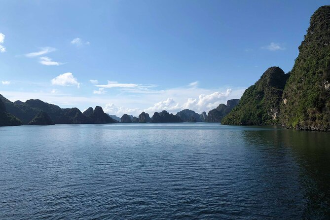Halong Bay Cruise With Cave, Kayaking, Swimming - Buffet Lunch - Cruising past Fighting Cock Islet