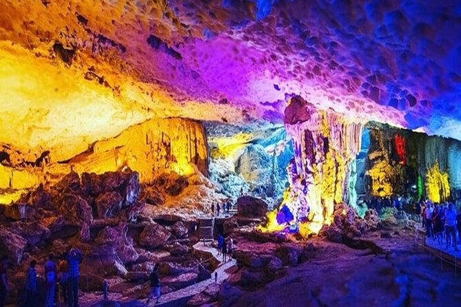 Halong Bay Day Tour: Visit Cave Island Kayaking Swimming Lunch - Boarding the boat and eating lunch among the limestone islands