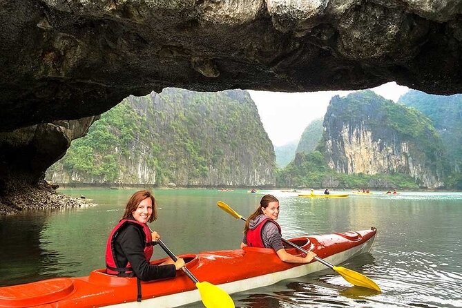 Halong Excursion Cruise with Kayaking, Swimming & Cave Visit - Boarding at Tuan Chau Harbor and lunch on the bay