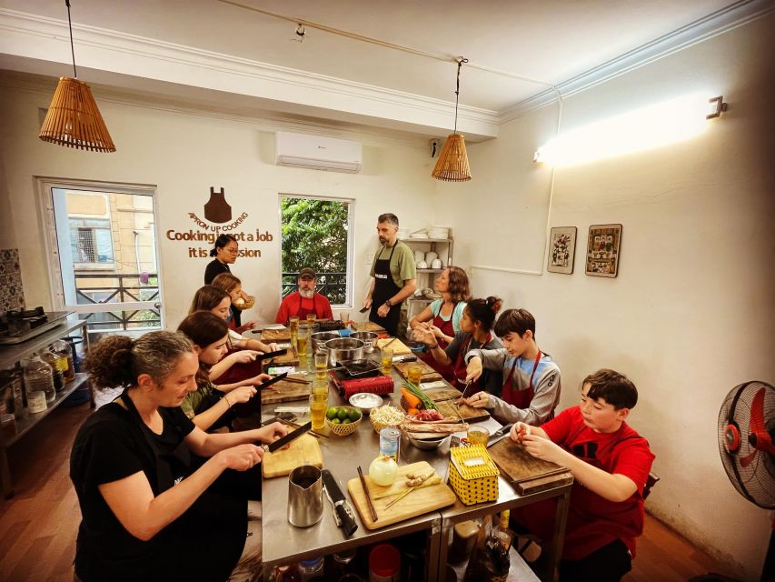 Hanoi: 5 Local Dishes Cooking Class with Meal & Market Visit - Sitting down to eat what you made