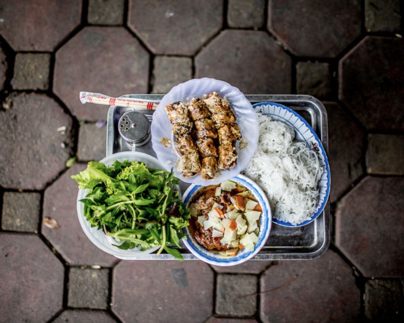 Hanoi: 7 Tastings Street Food Tour with Train Street - Bun Cha brings Hanoi’s signature grilled pork