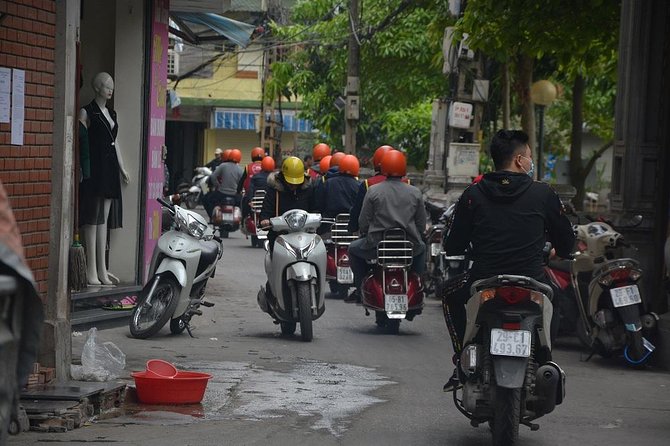 Hanoi Back Streets Vespa Tours: Hanoi Insider Vintage Vespa Tour - Reunification Railway Street up close