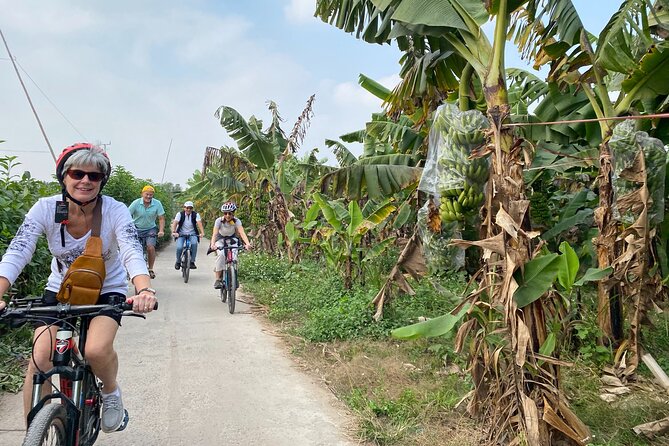 Hanoi City Bike Tour through Banana Island & Food Tasting - Riding out toward Banana Island