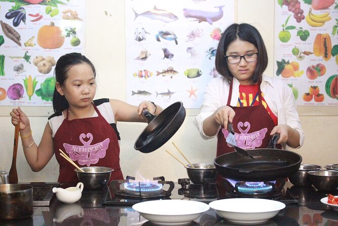 Hanoi Cooking Class and Market Tour in Ancient House - Sitting down to eat what you made